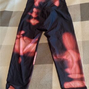 Black and cream Orange Reversible Cropped Leggings by With yoga
